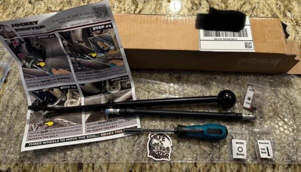 can-am-ryker-jockey-shifter-installed close-up-of-jockey-shifter-on-can-am-ryker rider-using-can-am-ryker-jockey-shifter chrome-can-am-ryker-jockey-shifter retro-style-jockey-shifter-for-can-am-ryker